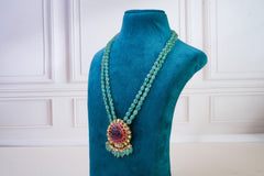 Aqua Green Beaded Kundan Pendant And Earrings